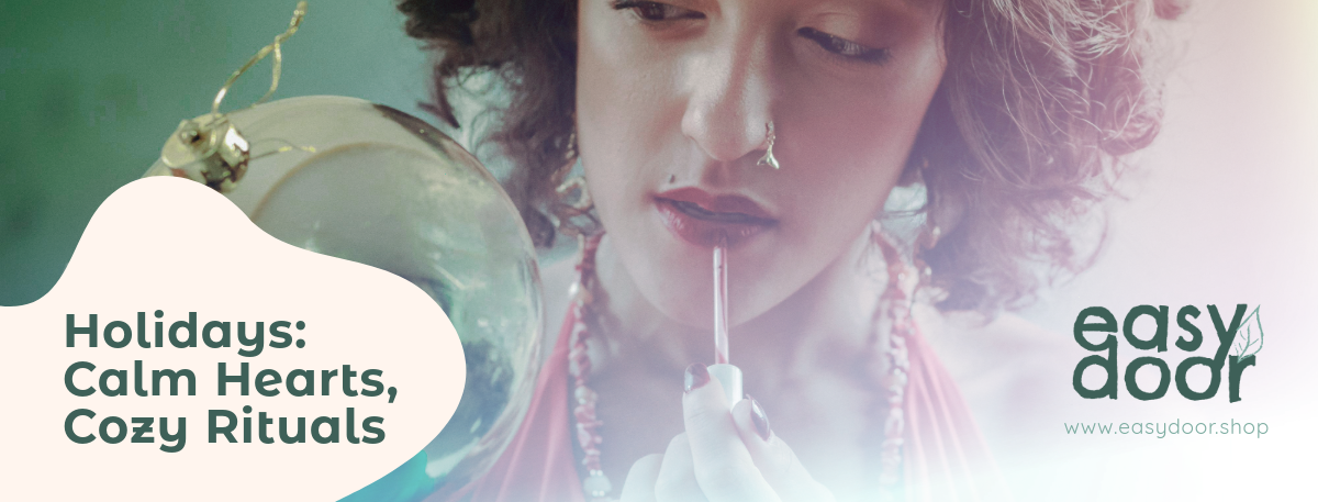 woman applying natural lipstick on her lips looking into the mirror christmas tree ornament.